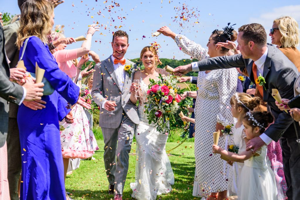 Bride and Groom confetti shot at Monkton Barn